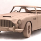 Illustration for article titled Full-Size Cardboard Aston Martin DB5 Comes Complete With Cardboard Spy Gadgets, Machine Guns